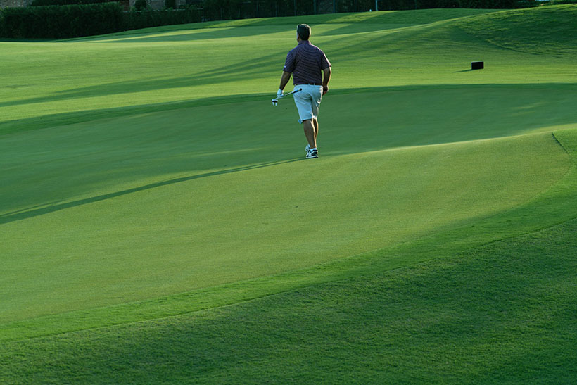 Man walking on the Rees course